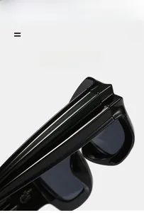 Macro detail of high-elasticity black sunglasses frame with durable hinge structure