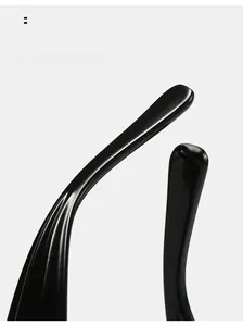 Macro detail of ergonomic curved mirror legs on stylish black punk square sunglasses