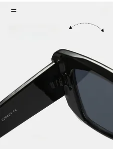 Detailed macro view of durable silver hinge and CE logo on black sunglasses arm