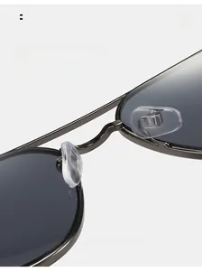 Close-up of comfortable silicone nose pads on double-bridge metal sunglasses
