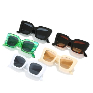 Square cat-eye sunglasses in various colors including black, white, and tortoiseshell