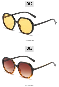 Detail view of octagon sunglasses in black yellow and tortoiseshell frames at 45-degree angle