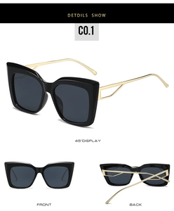 Three-way view of cat eye sunglasses with black frame and golden geometric temple details