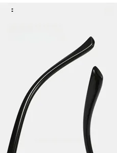 Detail of curved high-gloss black temple tips for comfortable ergonomic wear