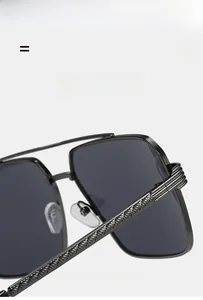 Detail view of double bridge sunglasses with woven texture metal arms and silicone pads