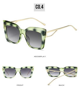 Three perspectives of Y2K cat-eye sunglasses with marble frames and gold metal temples