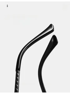 Macro detail of curved eyewear legs with non-slip texture on double bridge sunglasses