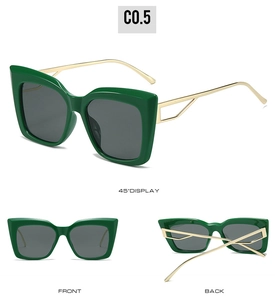 Three-way view of green cat-eye sunglasses with hollow gold temples and grey lenses