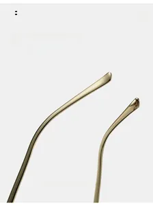 Detailed close-up of curved golden metal temples with ergonomic design for comfortable wear