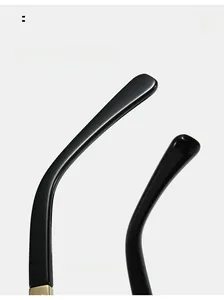 Detail of ergonomic curved black glasses temples with gold metal hinge accents