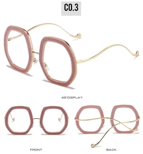 Three-view display of pink glitter hexagon glasses frames with gold metal temples
