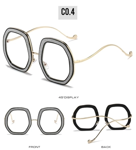 Detailed views of gold metal temple glasses with glitter accents from three angles