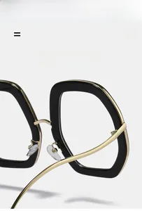 Detail shot of black and gold frames showing high-quality hinges and lightweight elastic metal