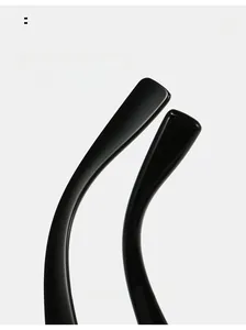 Close-up of ergonomic curved mirror legs on oversized cat eye sunglasses for comfort