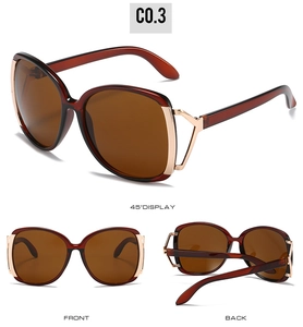 Multiple views of oversized sunglasses with brown gradient lenses and gold hollow temples