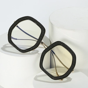 Fashionable oversized square eyeglasses with black glitter frames and gold metal temples