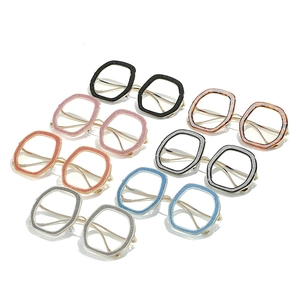 Oversized geometric blue light blocking glasses with glitter frames and metal temples
