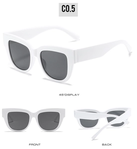 Vue triple de lunettes de soleil œil-de-chat blanches avec verres gris foncés