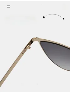 Macro view of durable metal hinge on irregular sunglasses for smooth folding