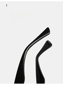 Detail of glossy black anti-slip temple tips for sports sunglasses with curved design