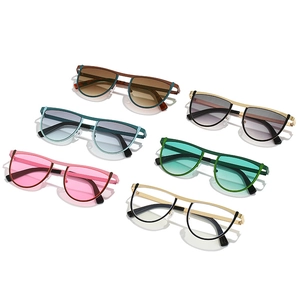 Stylish geometric irregular sunglasses with metal frames in various gradient lens colors