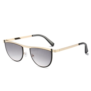 Fashionable geometric irregular sunglasses with gold metal semi-rim and grey gradient lenses