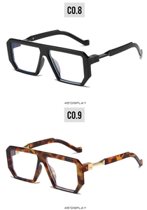 Detail view of bold geometric square sunglasses in black and tortoiseshell with metal hinges