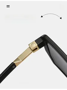 Macro shot of durable golden metal hinge on black square sunglasses with smooth folding