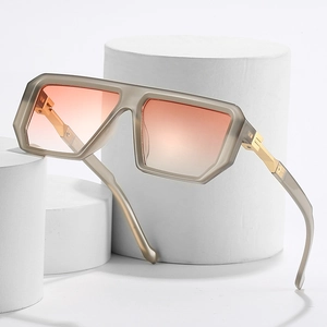 Modern oversized square sunglasses with taupe translucent frames and gradient lenses