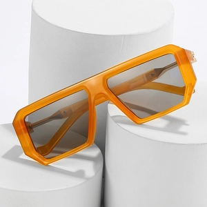 Oversized square sunglasses with amber orange frame and dark grey lenses for women