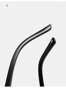 Detail view of the sleek curved temples on black Y2K cat-eye sunglasses for a comfort fit