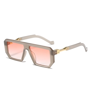 Oversized square sunglasses with translucent grey frame and orange gradient lenses
