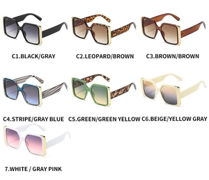 Multiple oversized square sunglasses with metal rim accents and gradient lenses