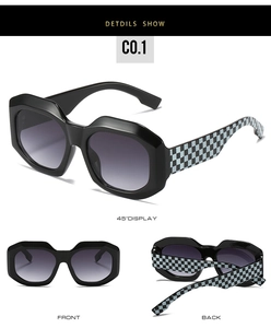Detail of oversized irregular sunglasses with blue checkerboard patterned temples