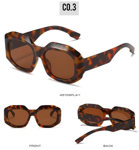 Detailed views of oversized geometric sunglasses with tortoiseshell frames and brown lenses