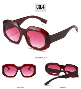 Checkered pattern on red-brown oversized sunglasses with pink gradient lenses