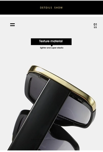 Close-up of square sunglasses with premium black frame and golden metal top trim detail