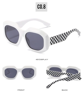 Close-up of retro square sunglasses with checkerboard temples and white thick frames