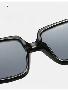 Close-up of comfortable integrated nose pads on black oversized square sunglasses