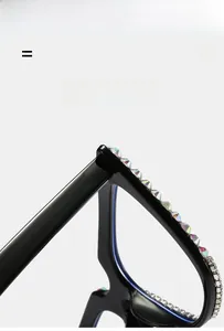 Close-up of sparkling colorful rhinestones on black lightweight sunglasses frame
