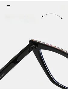 Detail of metal hinge and colorful rhinestone accents on black sunglasses frames