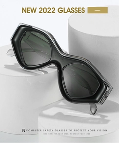 Detail view of stylish matte black cat-eye sunglasses with computer safety lenses