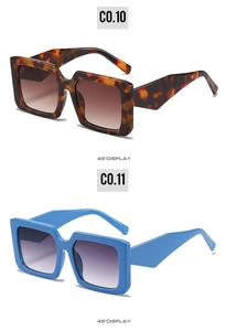 Detail view of square sunglasses with leopard and royal blue wide geometric temples