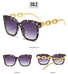 Three-view display of tortoise sunglasses with purple gradient lenses and gold chain temples
