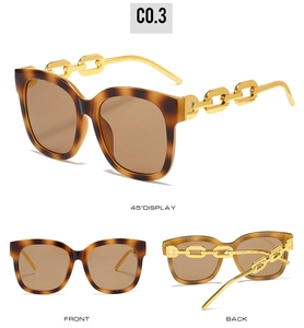 Detailed views of tortoise shell sunglasses with unique gold chain temple design
