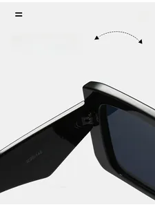 Detailed macro view of durable reinforced metal hinges on square black fashion sunglasses