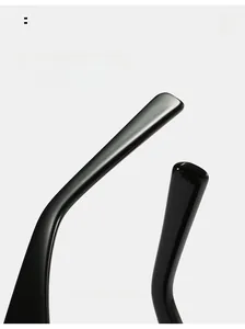 Detail view of glossy black curved sunglass temples for enhanced wearing comfort