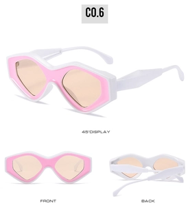 Three-angle display of white cat eye sunglasses with pink inner trim and orange lenses