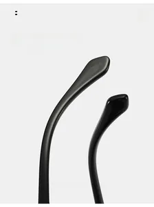 Close-up of sleek black curved temples on cat eye sunglasses for maximum comfort