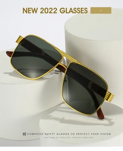 Detail view of double bridge aviator sunglasses with gold frame and wood grain temples